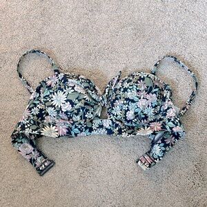 Bikini top with floral design.